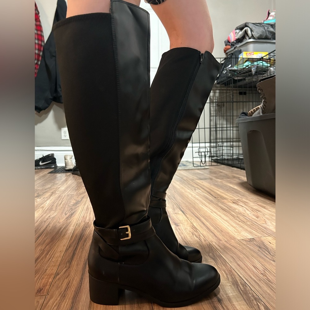 Tall boots, up to the knee. Brand new!